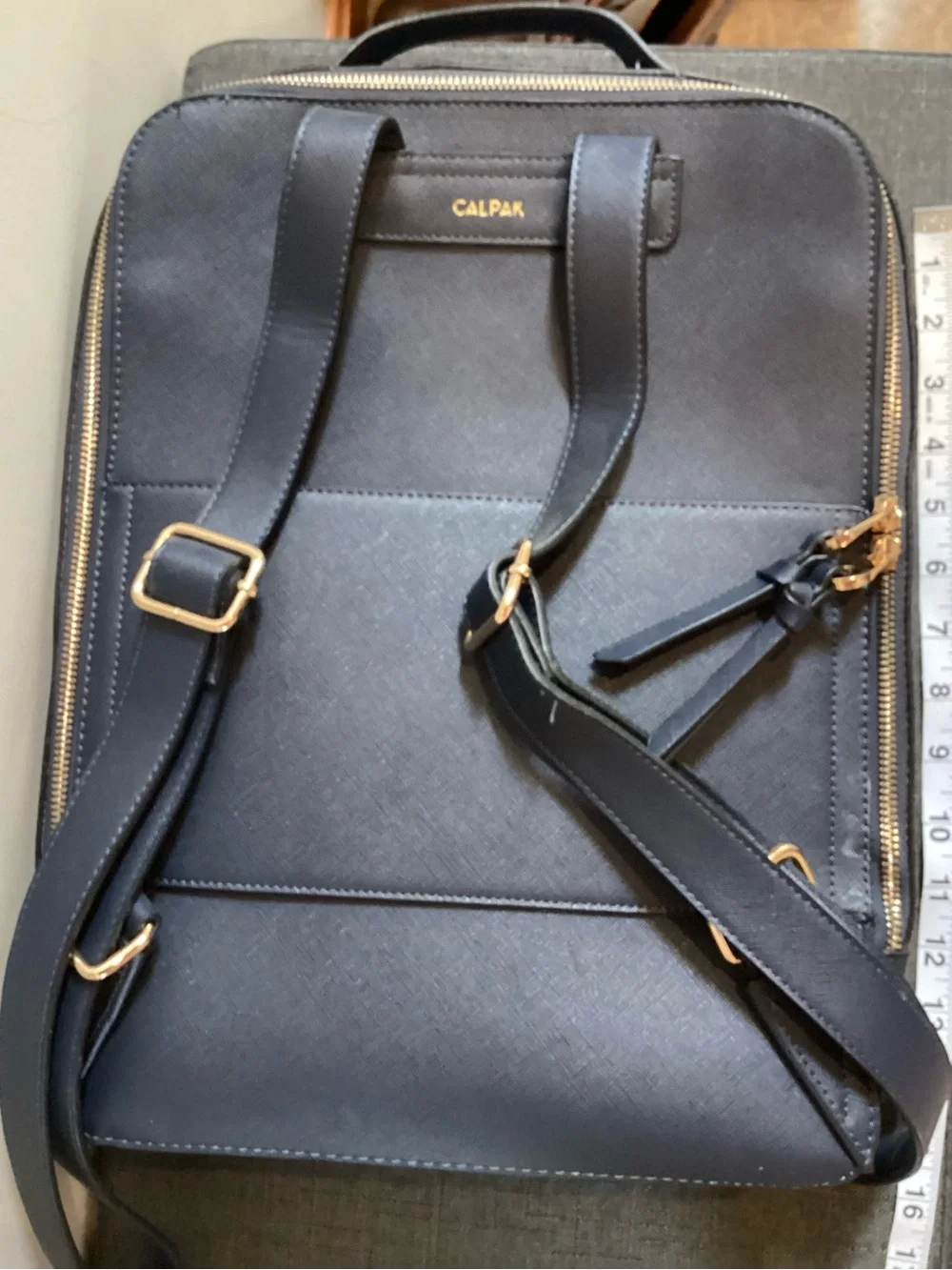 Calpak Navy Leather Backpack with Whipstitch Trim